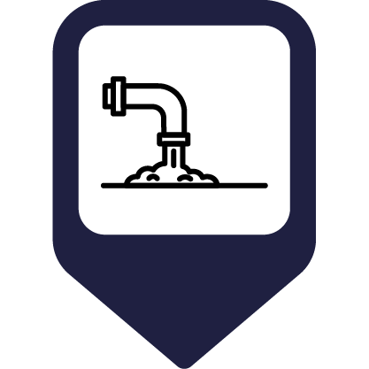 A 90 degree angle pipe with material coming from it