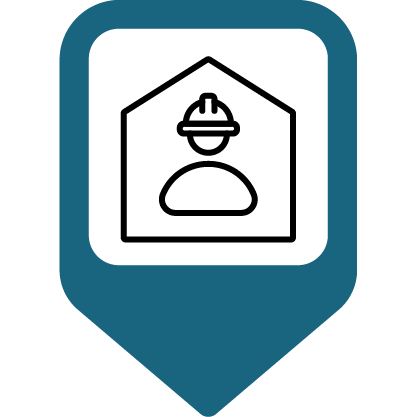 Person icon with a hard hat in a building
